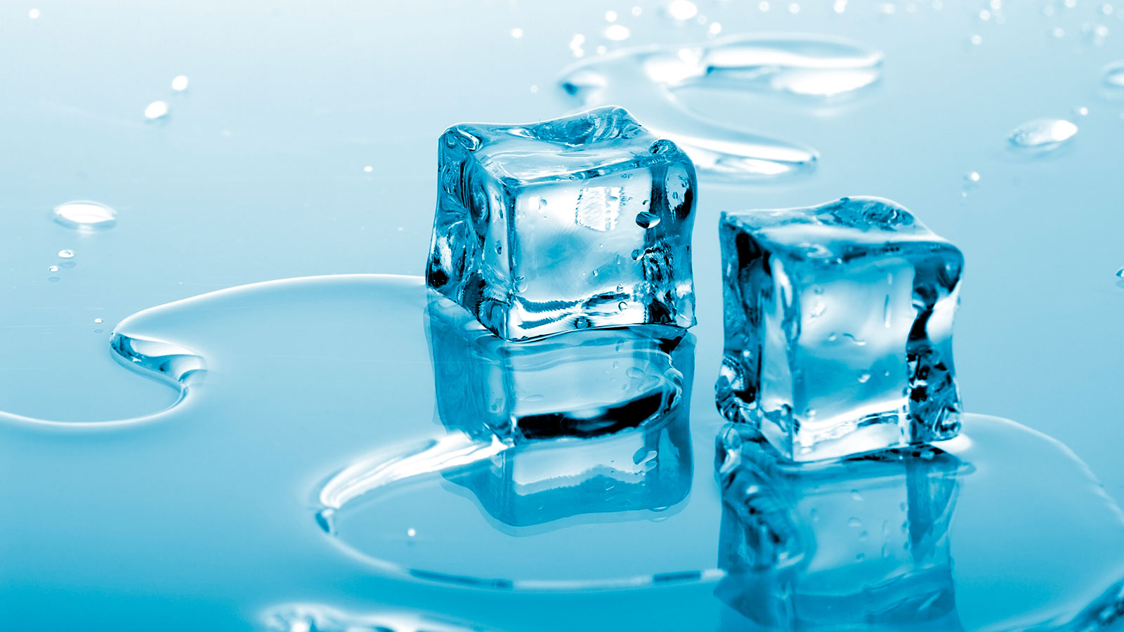 Two ice cubes in the process of phase changing from solid to liquid
